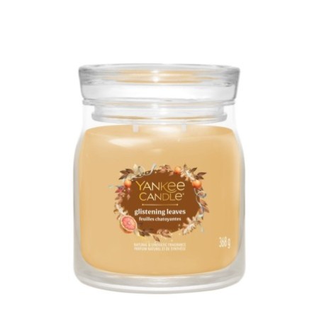 GLISTENING LEAVES Świeca średnia - Yankee Candle